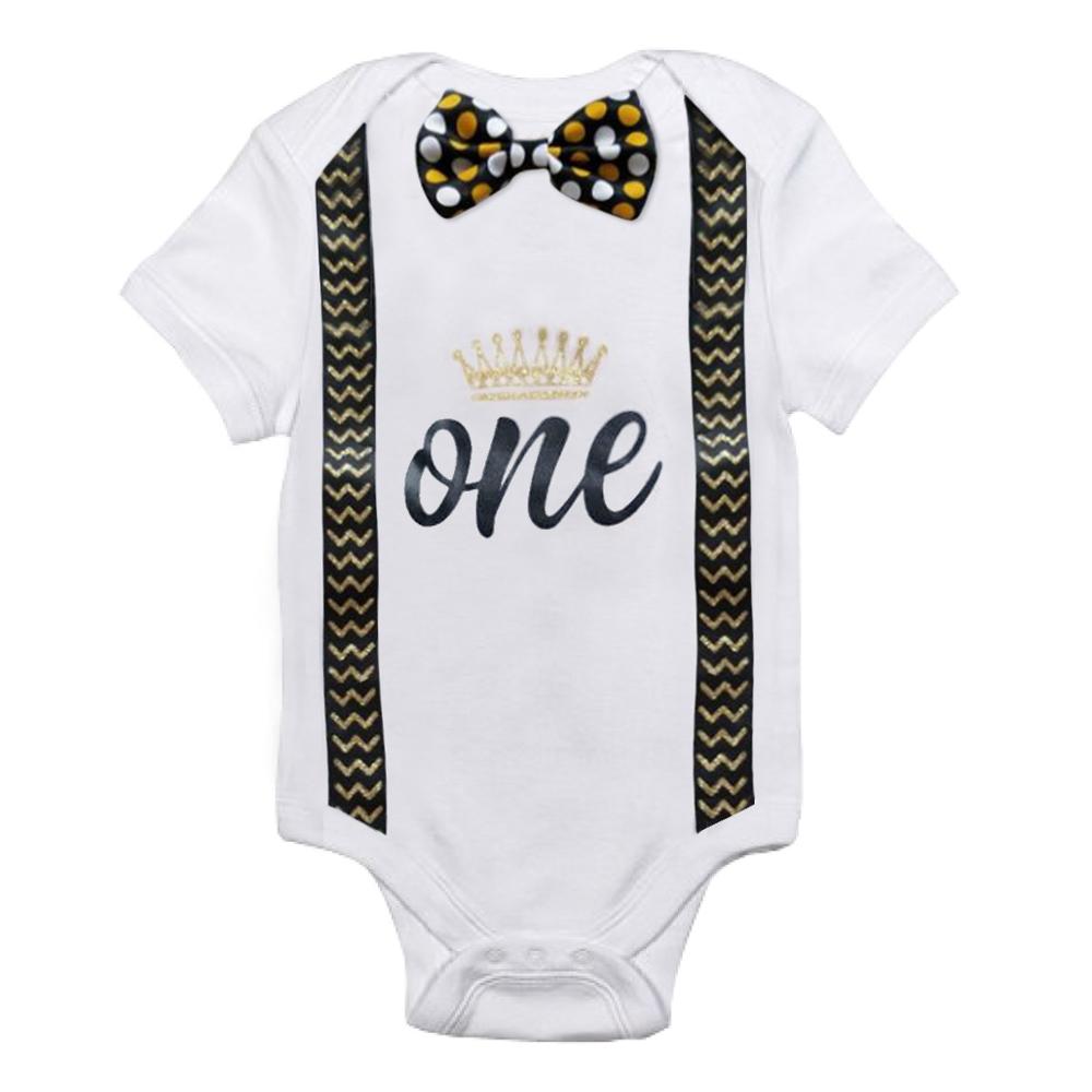 Celebration-ready baby boy romper with plaid bow tie and matching suspenders, perfect for a 1st birthday.