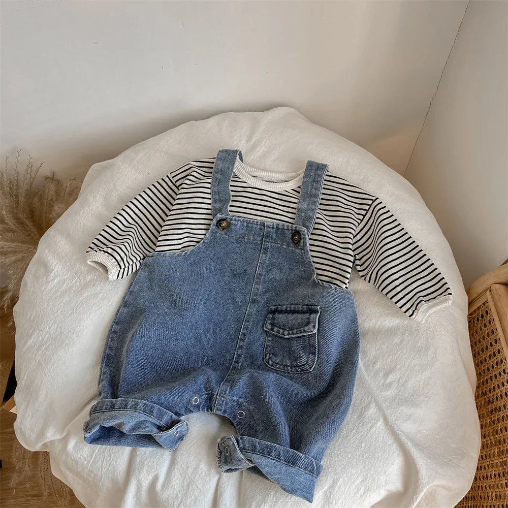 Side view of baby boy's suspender trousers, highlighting the adjustable straps
