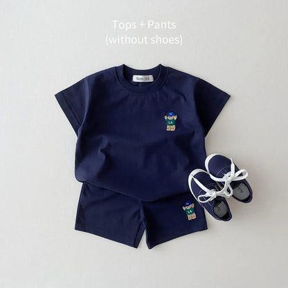 Back view of baby boy's white shorts from the bear embroidery set, comfortable and simple design