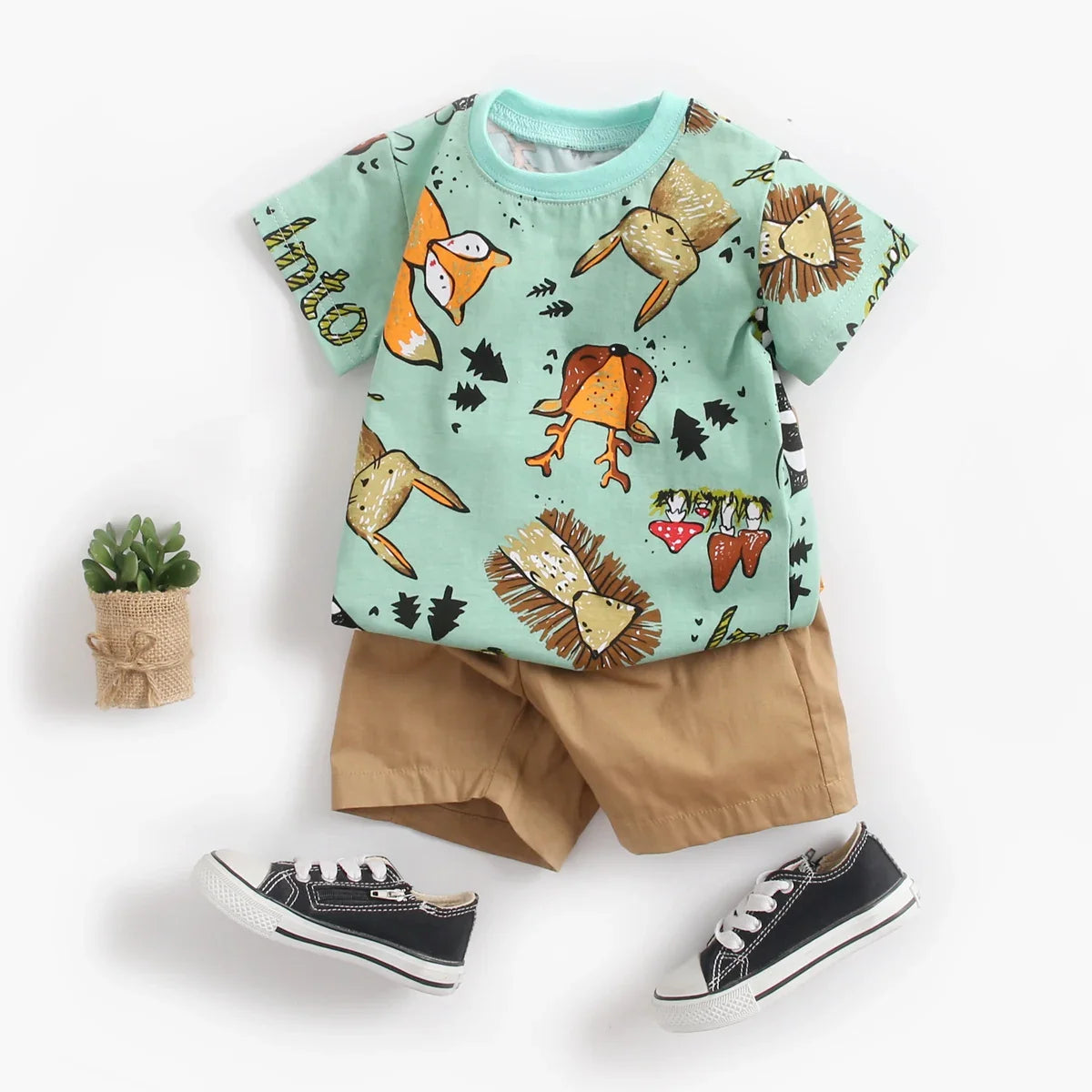 Stylish baby boy's cotton outfit with a bright cartoon graphic short sleeve top and shorts.