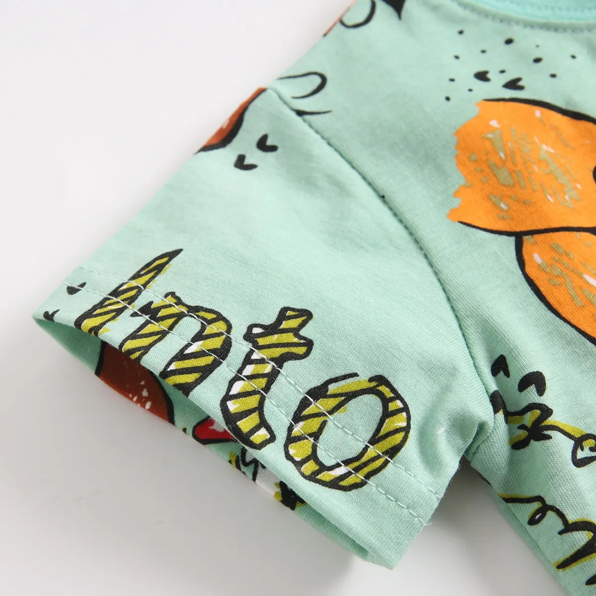 Durable baby boy's cotton short sleeve top and shorts set with fun cartoon prints.