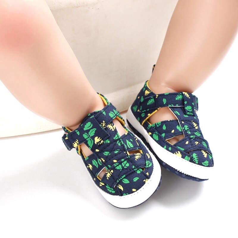 Infant boy's soft sole sandals with snap closure, blue canvas, ideal first walker footwear