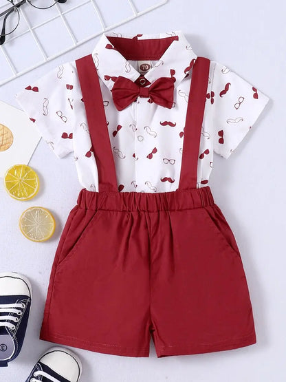 Baby boy's classic gentleman set, consisting of a bow tie bodysuit and stylish suspender trousers