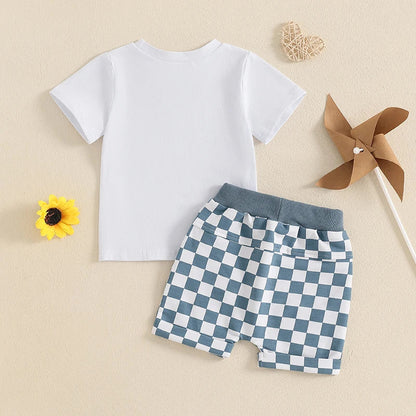 Infant casual summer outfit featuring a 'COOL' letter print tee and stylish checkerboard shorts.