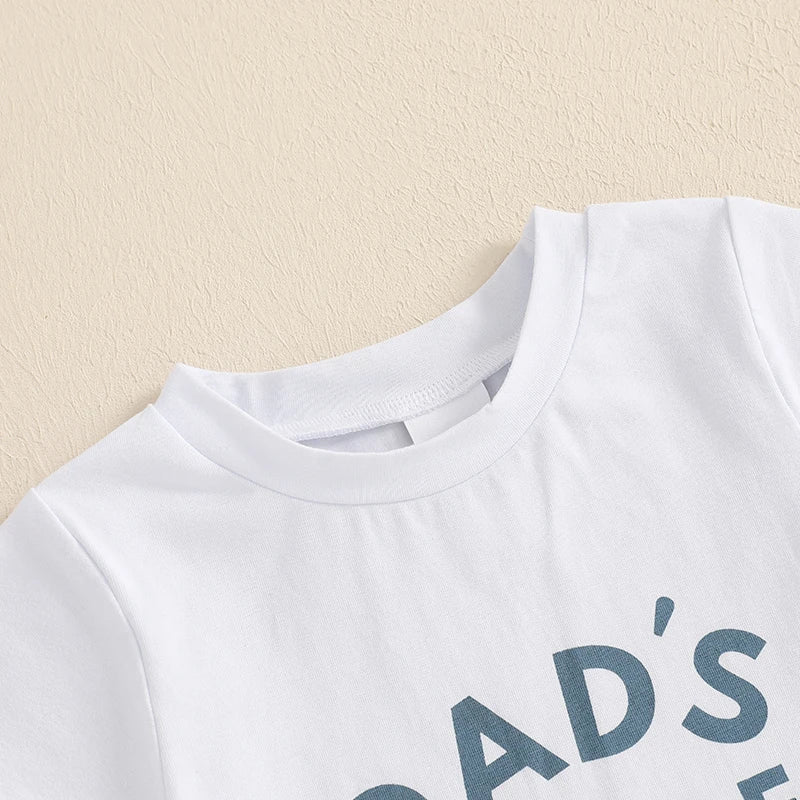 Toddler fashion: baby boy's short sleeve t-shirt with print and matching checkerboard shorts set.