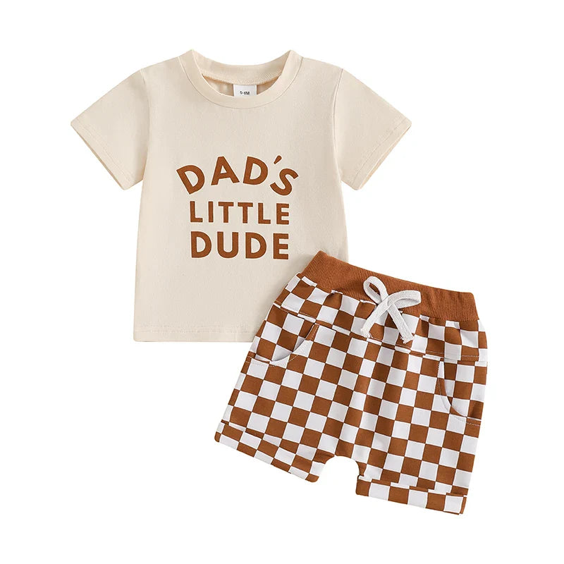 Baby boy's fashionable summer set: printed t-shirt and black & white checkerboard pattern shorts.