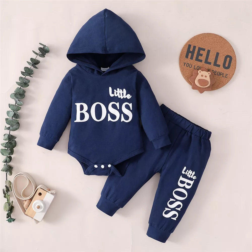 Newborn boy in a soft, comfortable grey hoodie jumpsuit and pants set, infant fashion.