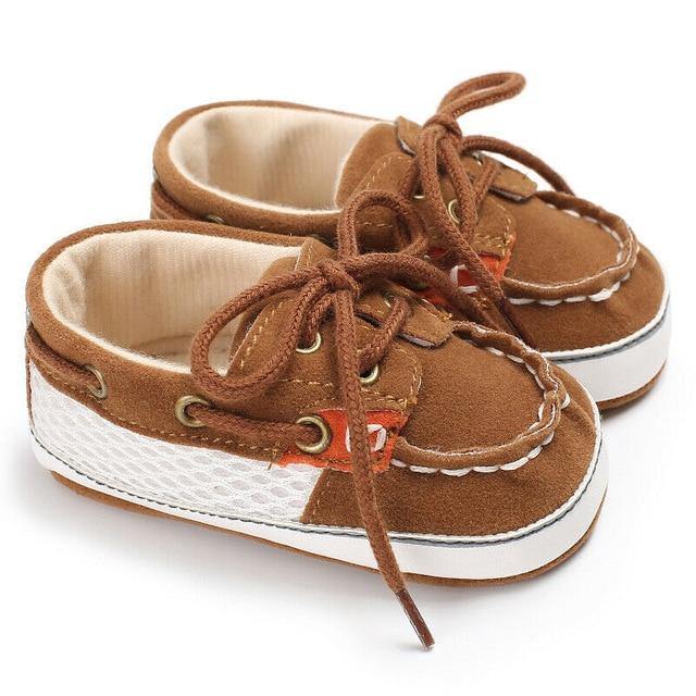 Baby boy's first walker loafer shoes in a classic design, soft and supportive for tiny explorers.