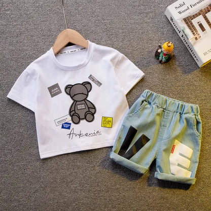 Baby boy's summer fashion outfit; blue short sleeve shirt and striped shorts for toddlers.