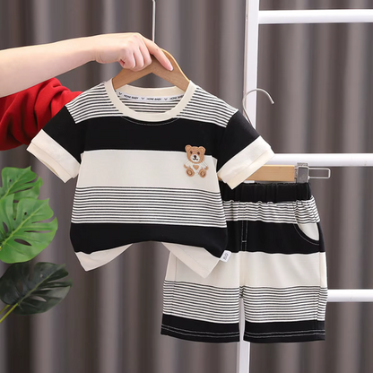 Baby boy's two-piece cotton set with cute bear print top and matching shorts, ideal for summer playtime.
