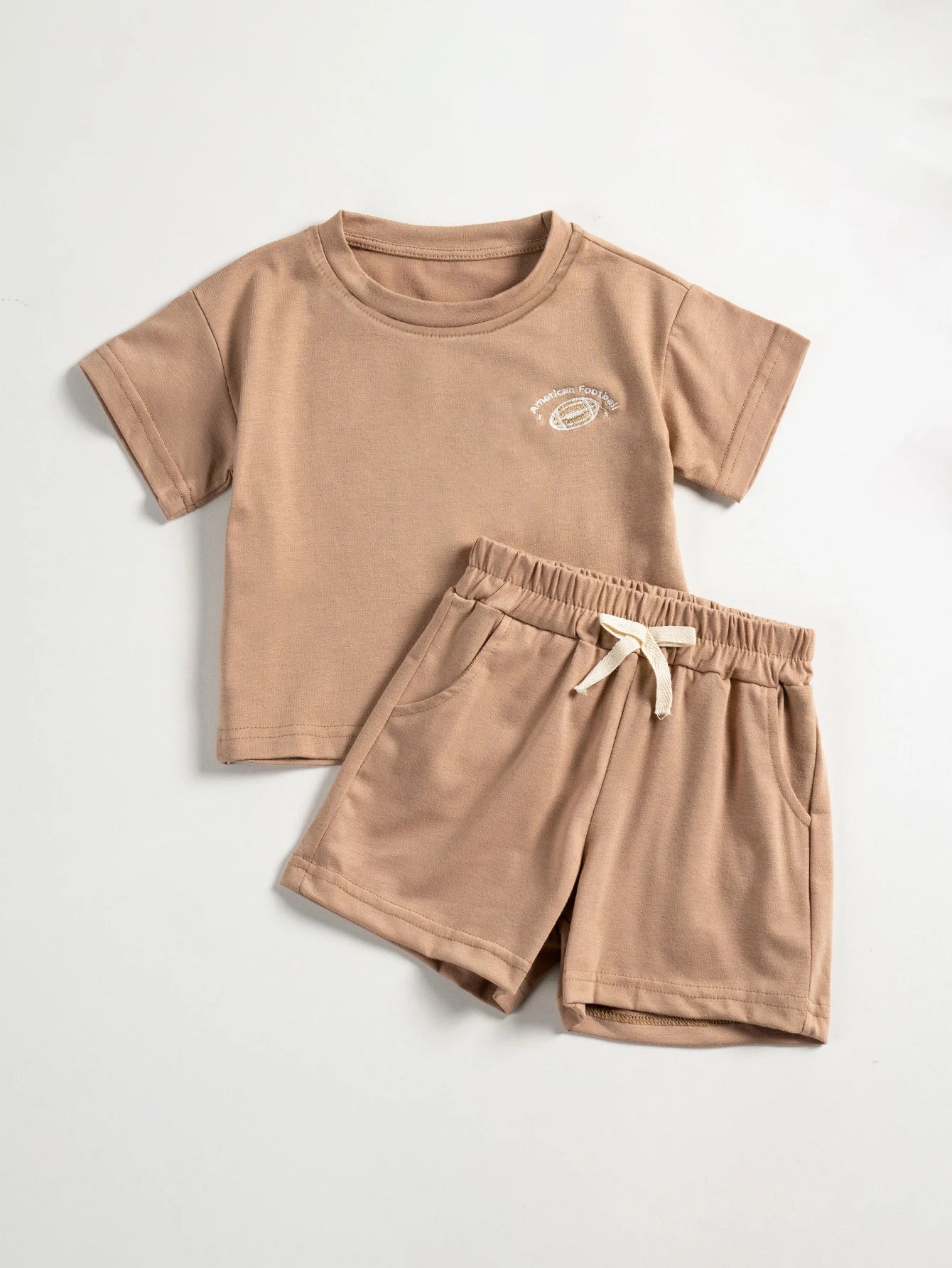 Baby boy's white t-shirt and blue shorts set with colorful daisy embroidery on chest