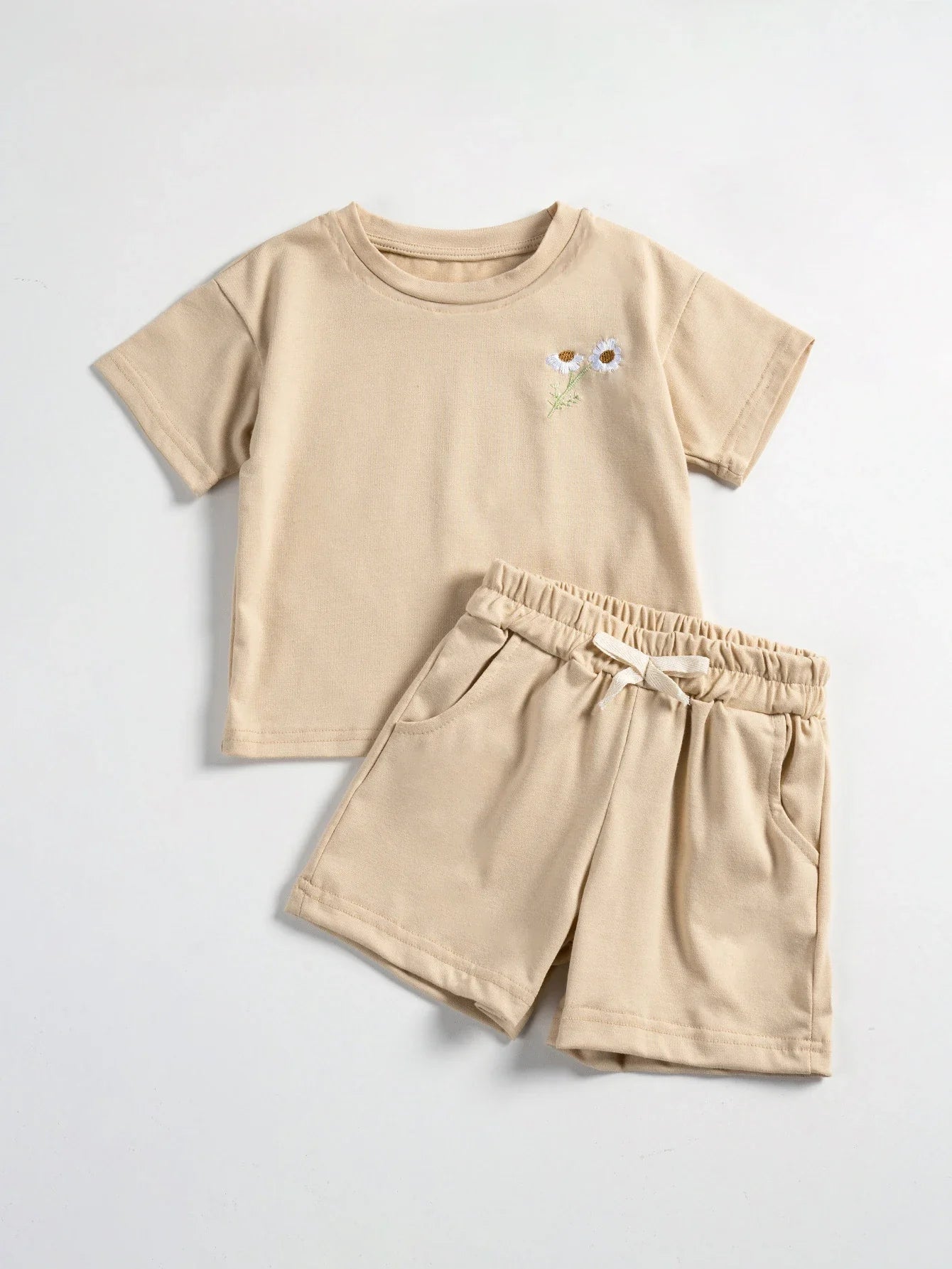 Casual boys' clothing set: white t-shirt featuring vibrant daisy embroidery, blue elasticated shorts