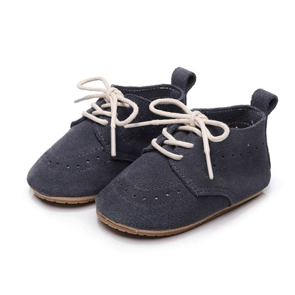 Baby boy first walker shoes in genuine leather, offering support and flexibility for active toddlers