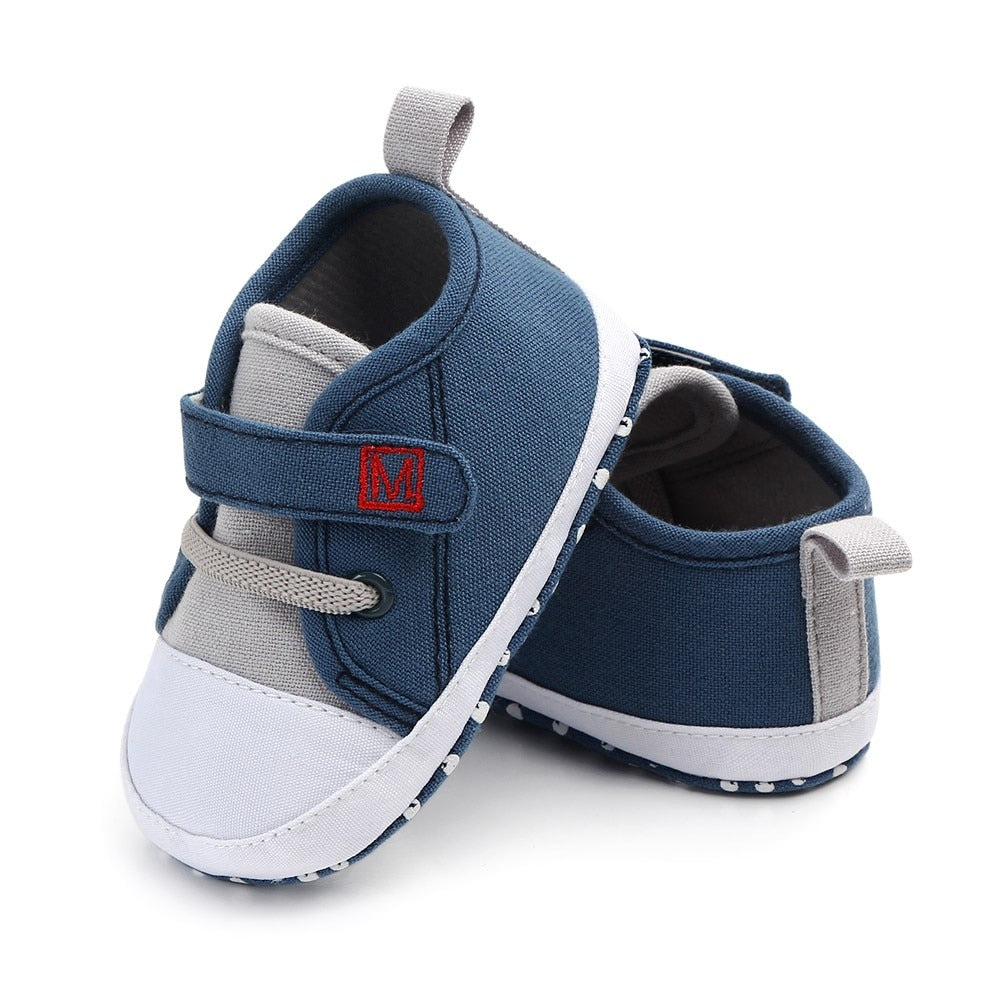 Pair of baby boy tri-color first walker sneaker shoes, soft sole for infant comfort