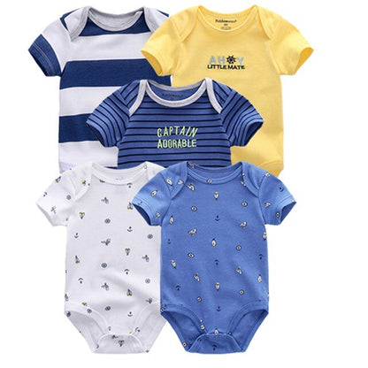 Stack of five different colored and printed cotton short sleeve onesies for baby boys.
