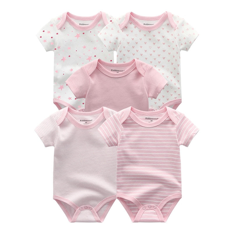 Detail of print on a newborn essentials short sleeve onesie from the baby boy 5-pack.