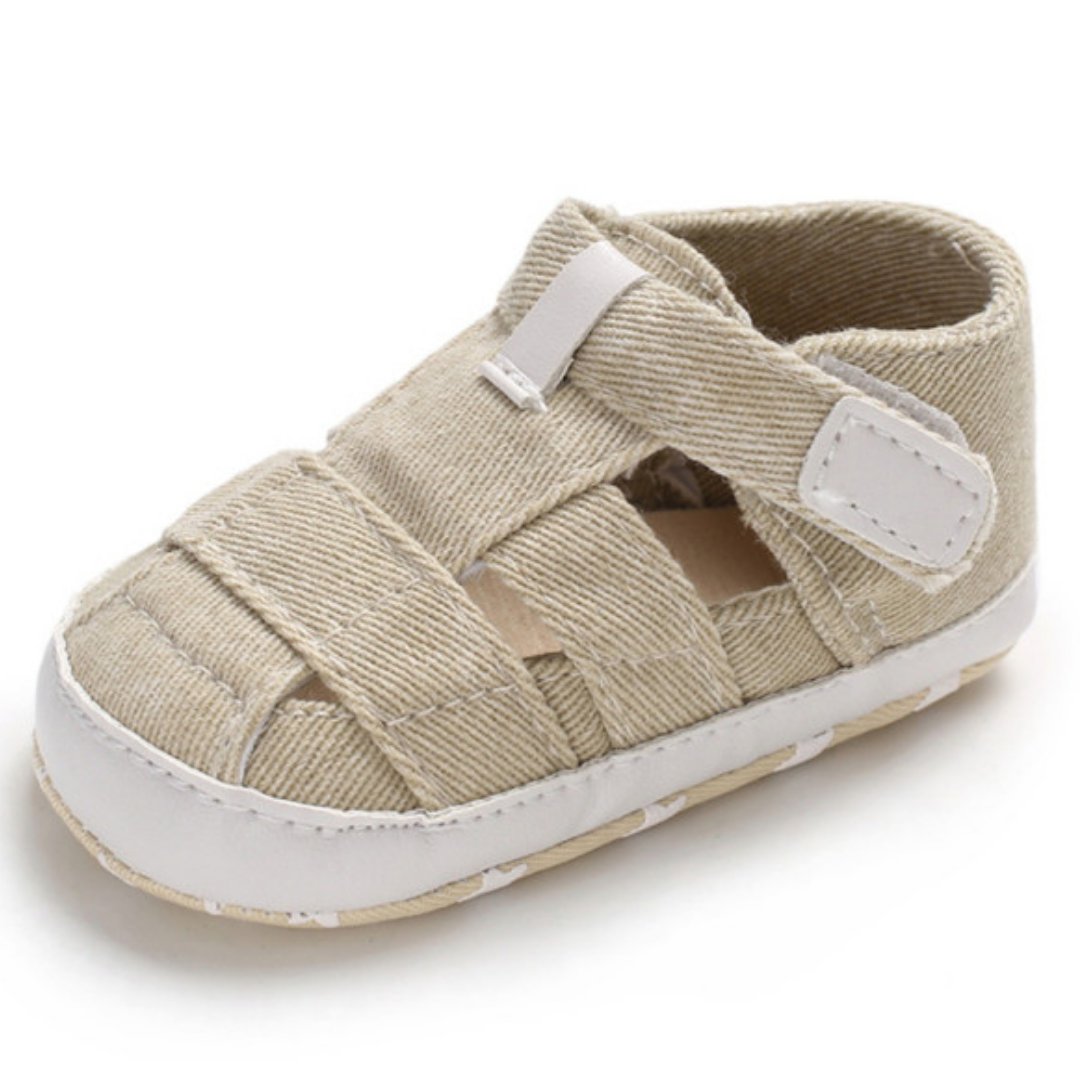 Toddler boy's navy canvas soft sole sandals, designed for comfort and early walking support