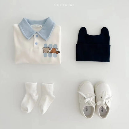 Baby boy's full-body cotton romper in white with colorful cartoon vehicle prints.