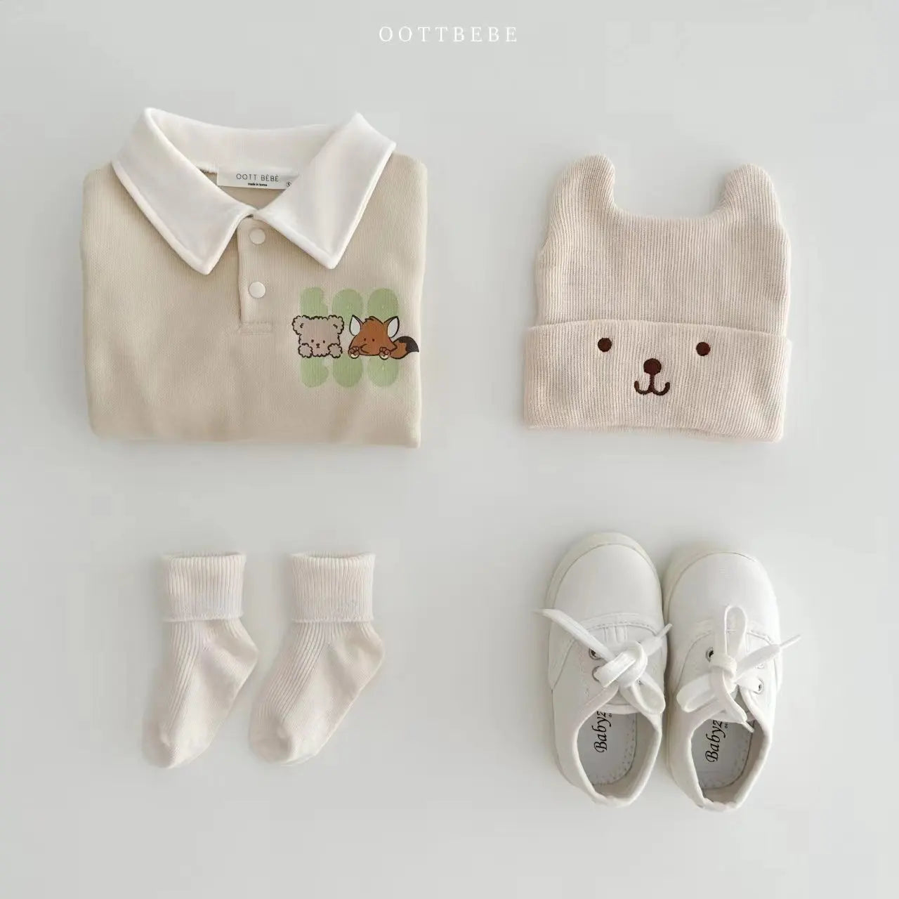 Comfort-fit baby boy cotton romper, long-sleeved, featuring a sweet cartoon character on the front.
