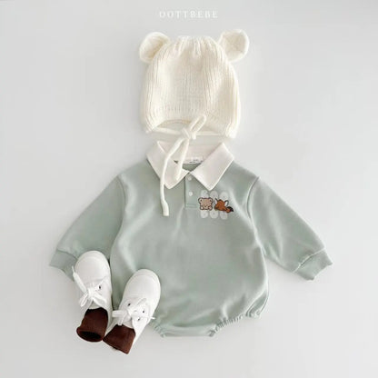 Newborn boy's cotton romper in vibrant colors with adorable cartoon print, ideal for daily wear.