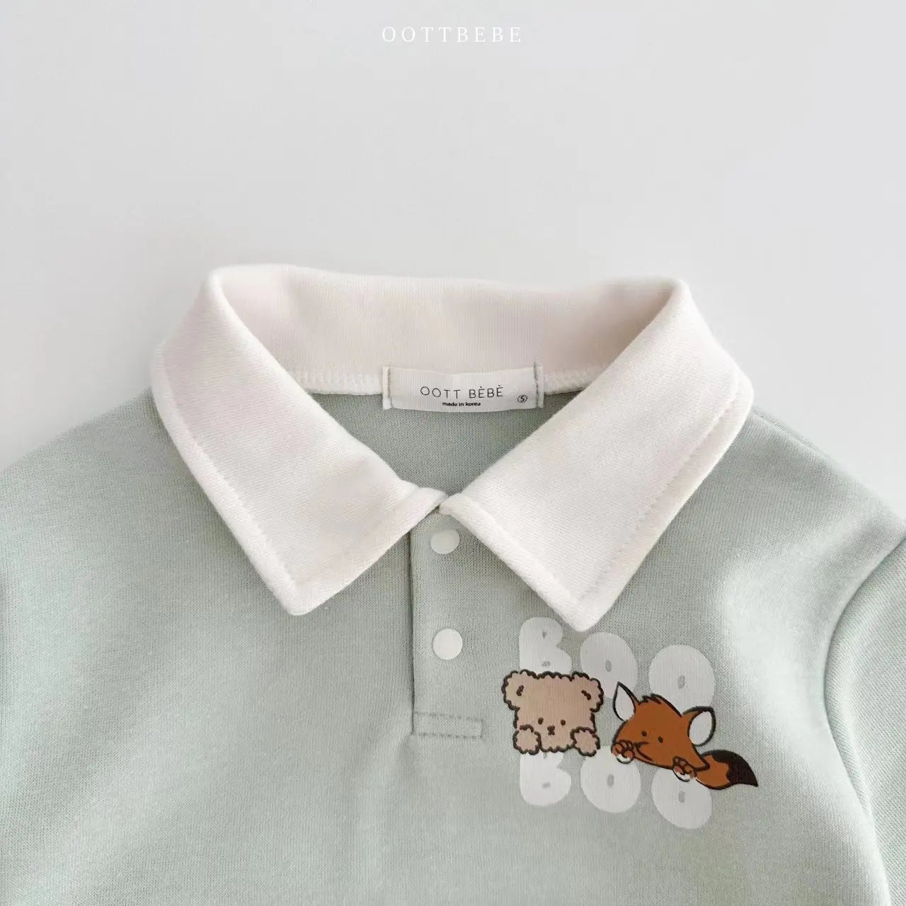 Infant boy's comfortable cotton romper with a charming cartoon, great for baby fashion.