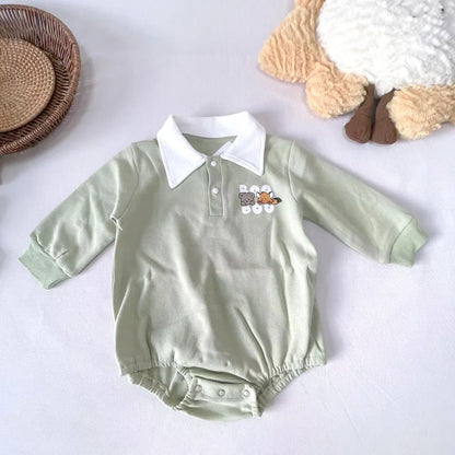 Kids' long sleeve cotton romper for boys, featuring a lively cartoon animal print.