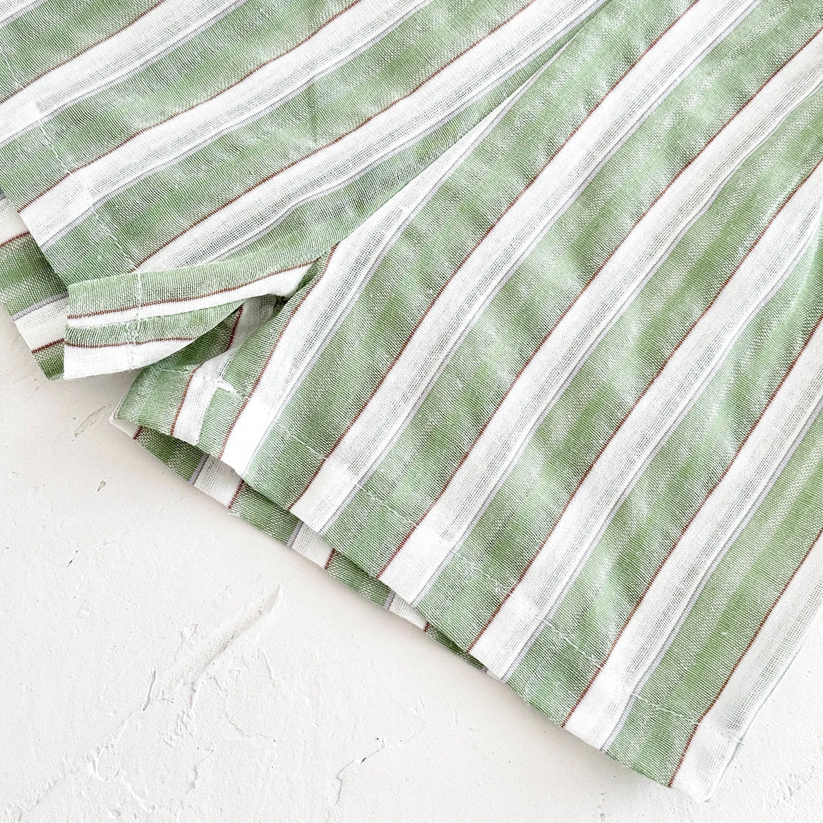 Toddler outfit: green stripe short-sleeve shirt and matching pull-on shorts