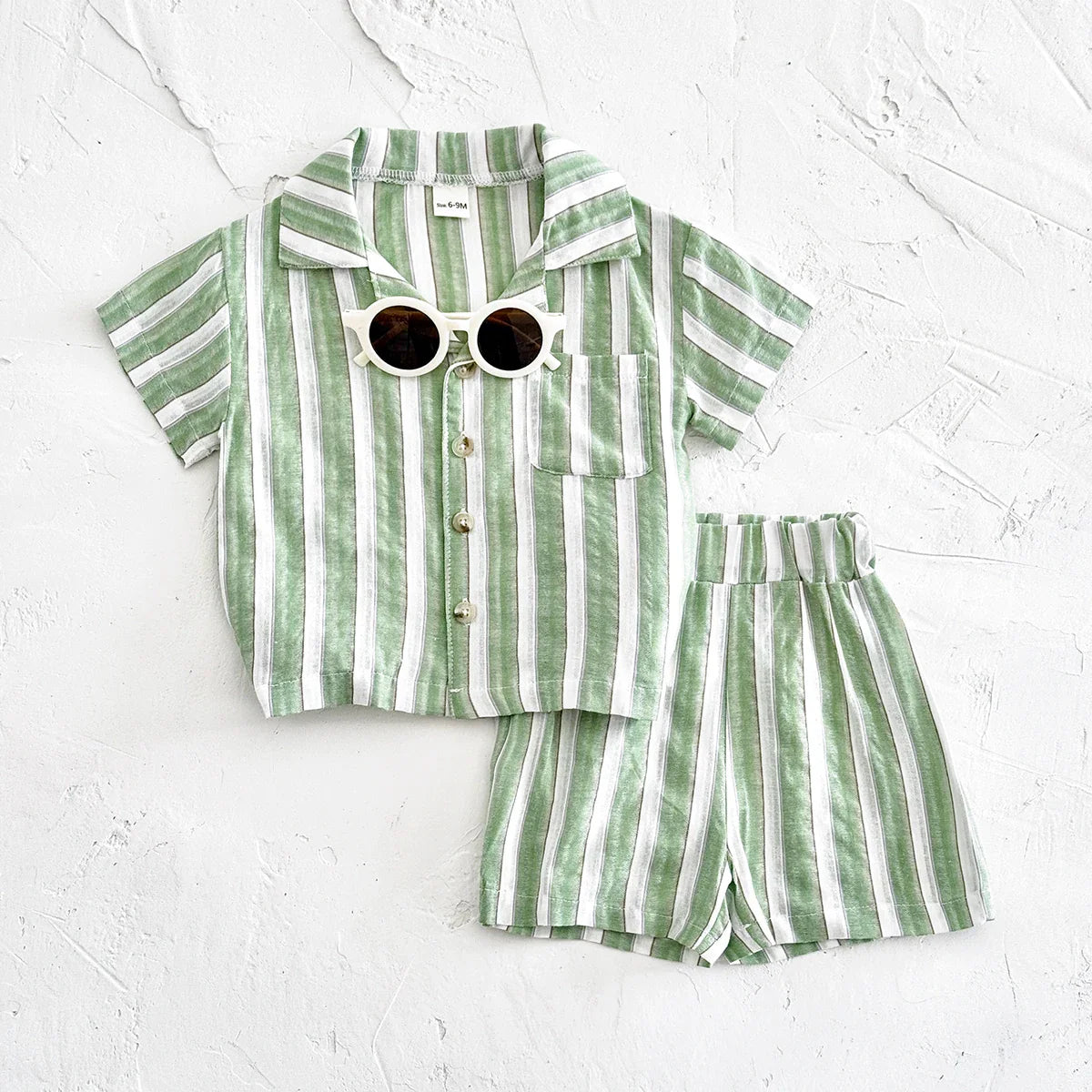 Baby's green stripe shorts with elastic waistband and folded hem for summer