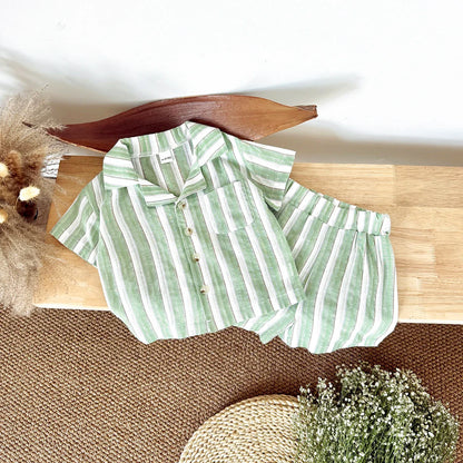 Two piece baby summer outfit: green stripe short-sleeve shirt and coordinating shorts