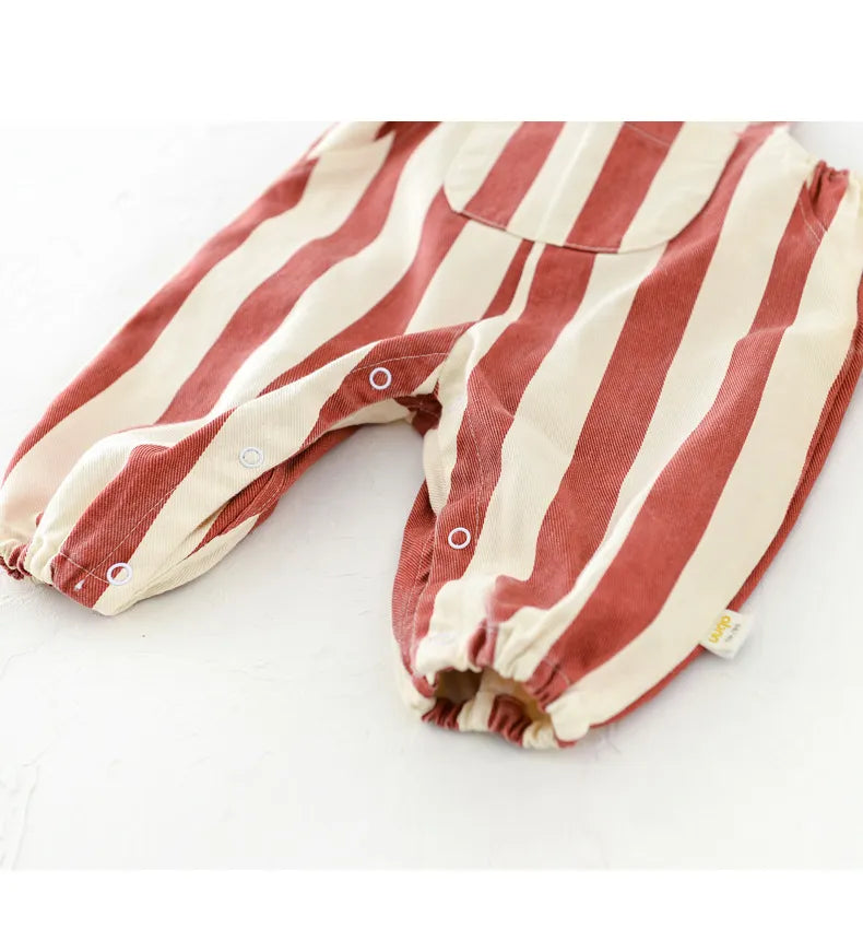 Unisex baby striped romper with colorful accents, perfect for vibrant spring looks
