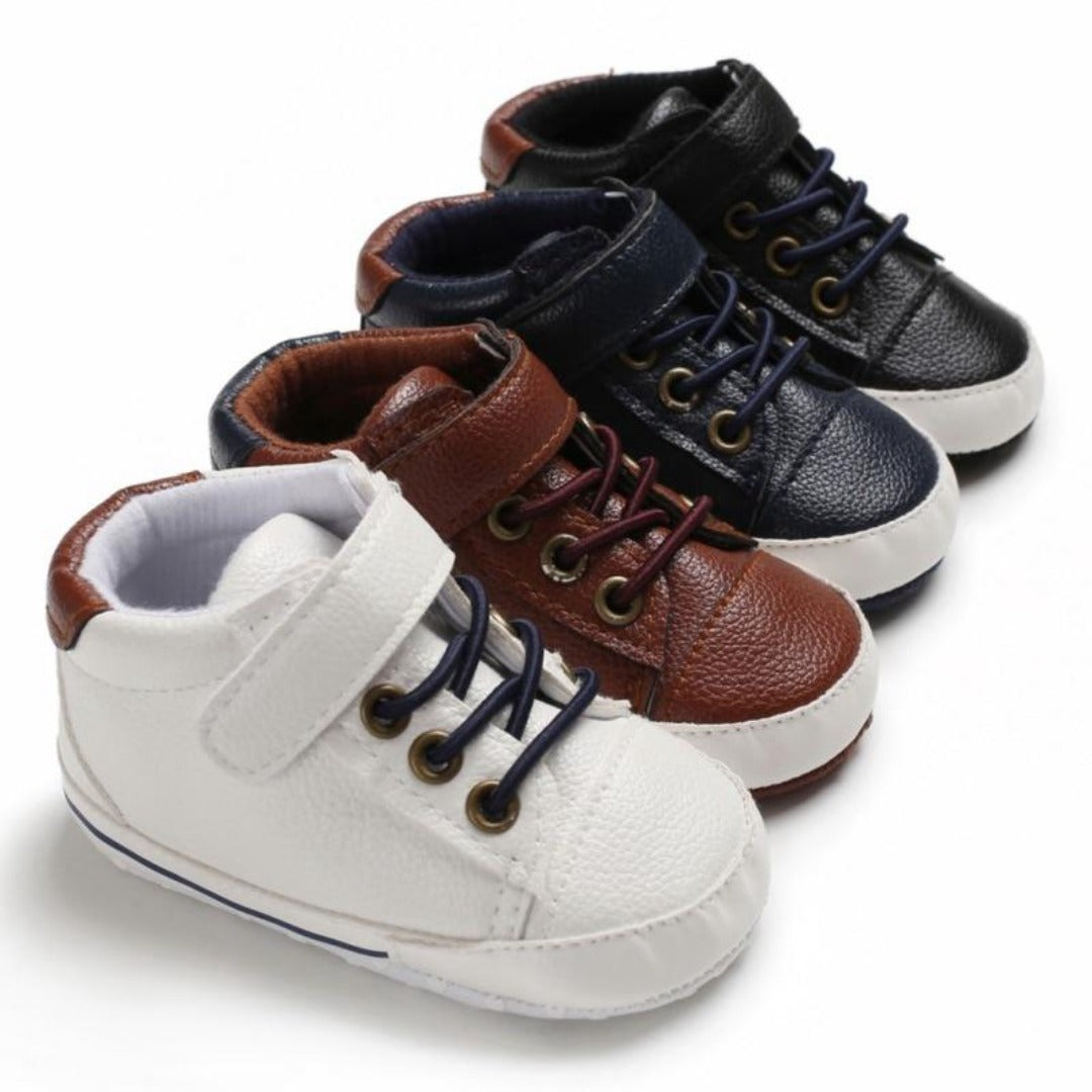 Baby boys' soft sole first walker leather sneakers, anti-slip design, comfortable infant shoes.