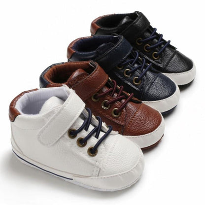 Baby boys' soft sole first walker leather sneakers, anti-slip design, comfortable infant shoes.