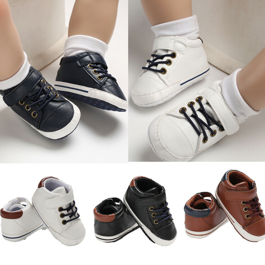 Tan leather style baby boy first walker sneakers with soft sole for new walkers.