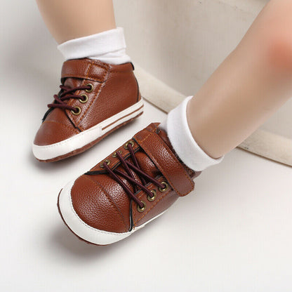 Close-up of flexible soft sole baby boy sneakers, ideal for first steps, comfortable and safe.