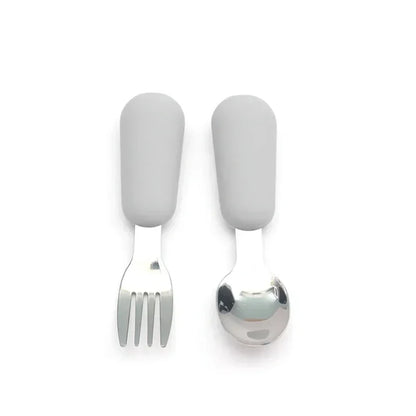 BPA-free stainless steel baby spoon with a cheerful cartoon design, suitable for weaning
