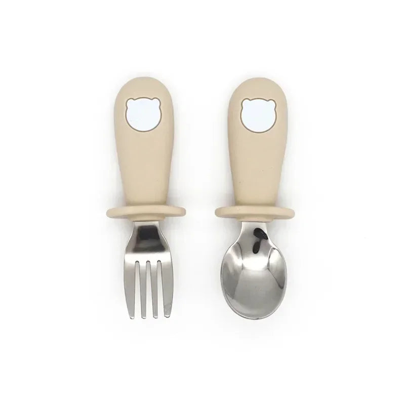 Cartoon utensils: Stainless steel fork with a colorful animal design handle for toddlers, safe