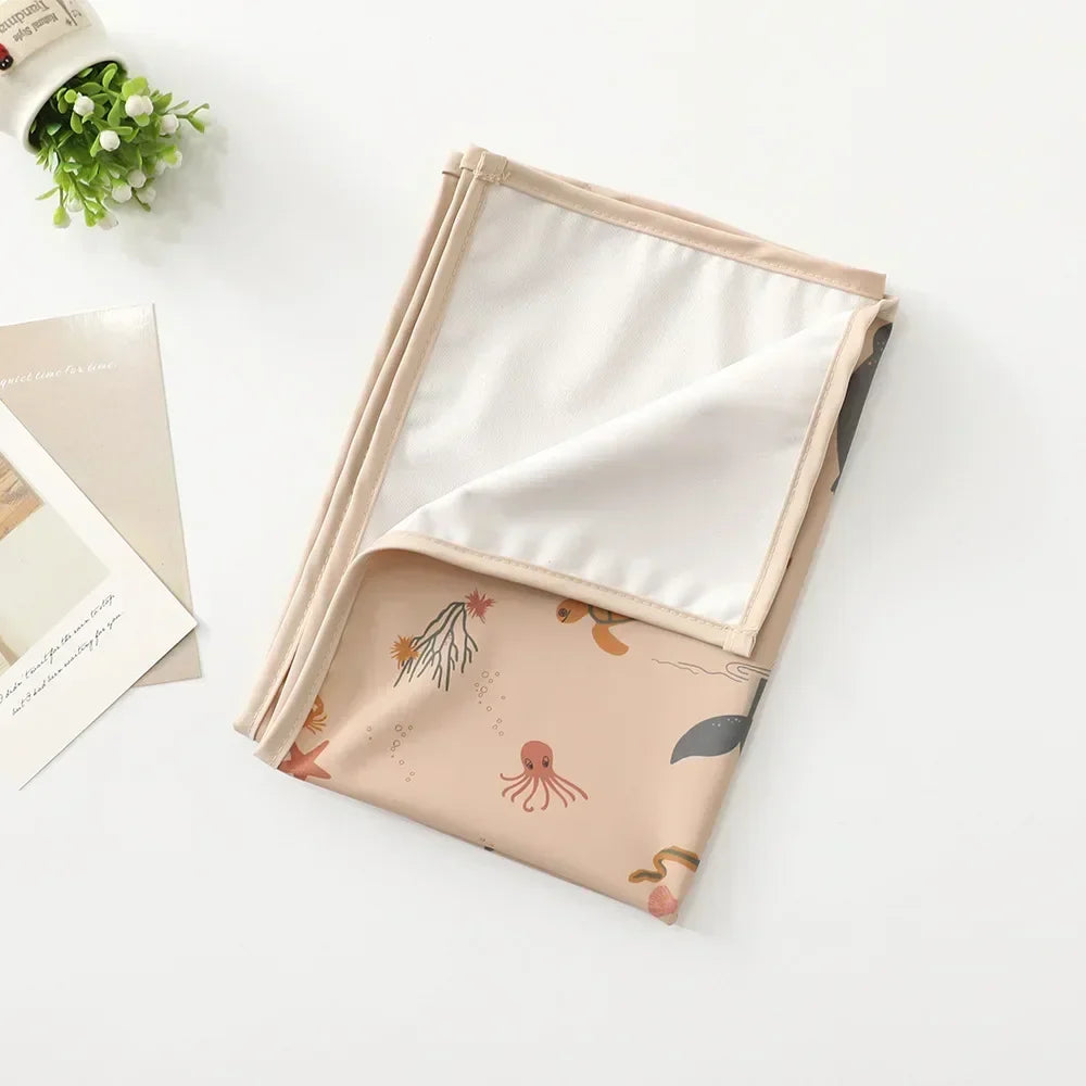 Eco-friendly reusable changing mat, designed for ultimate baby comfort & hygiene.