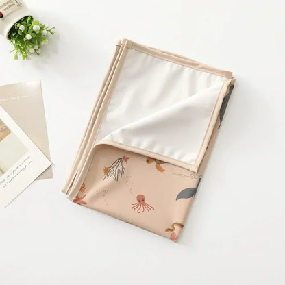 Eco-friendly reusable changing mat, designed for ultimate baby comfort & hygiene.