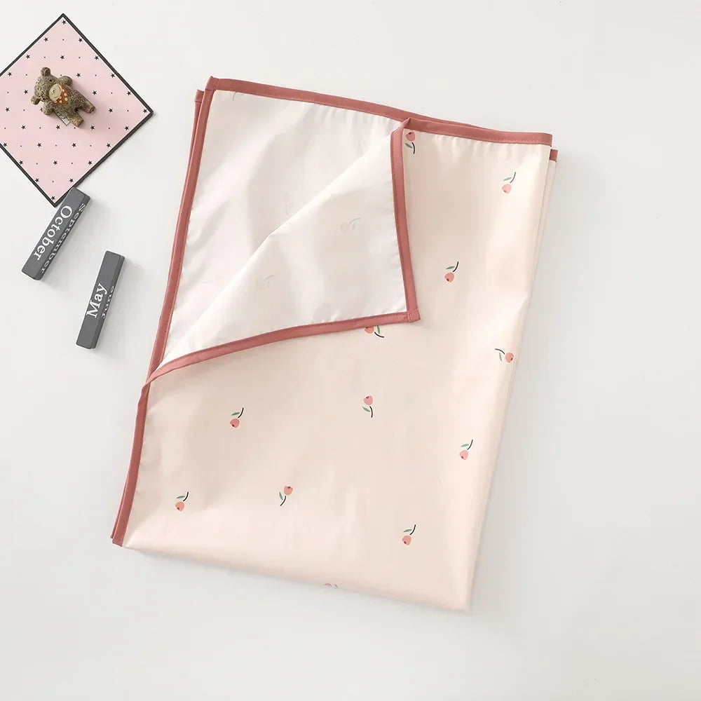 Infant changing mat folded, showcasing its portability and compact design.