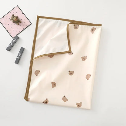 Baby changing mat with a ruler print, useful for tracking baby's growth.