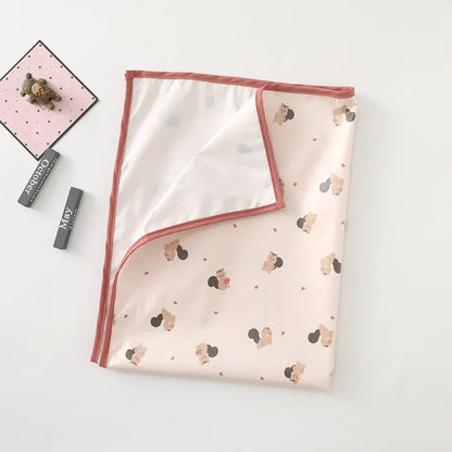 Stylish baby changing pad with a modern pattern, suitable for any nursery.