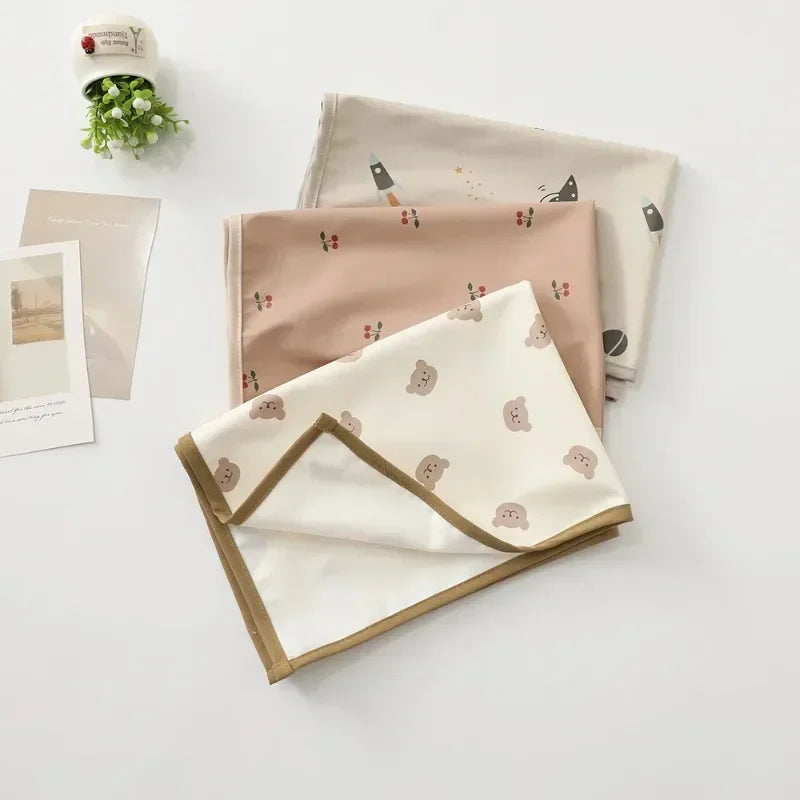 Portable baby changing mat for diapering, waterproof & soft, ideal for newborns.