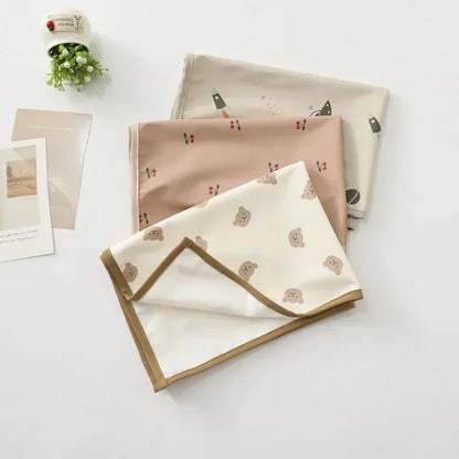 Portable baby changing mat for diapering, waterproof & soft, ideal for newborns.