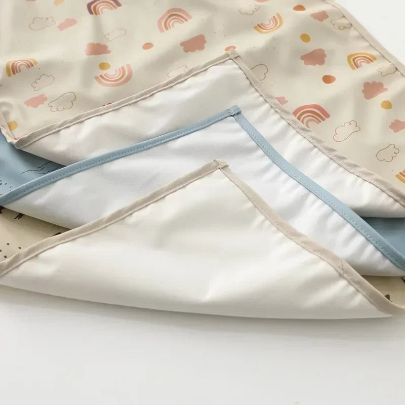 Close-up of a baby changing mat texture, highlighting its waterproof and soft material.