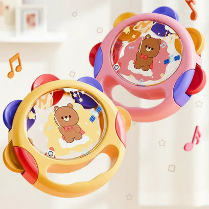 Baby cheerfully shaking a BPA-free interactive tambourine toy, promoting motor skills and rhythm development