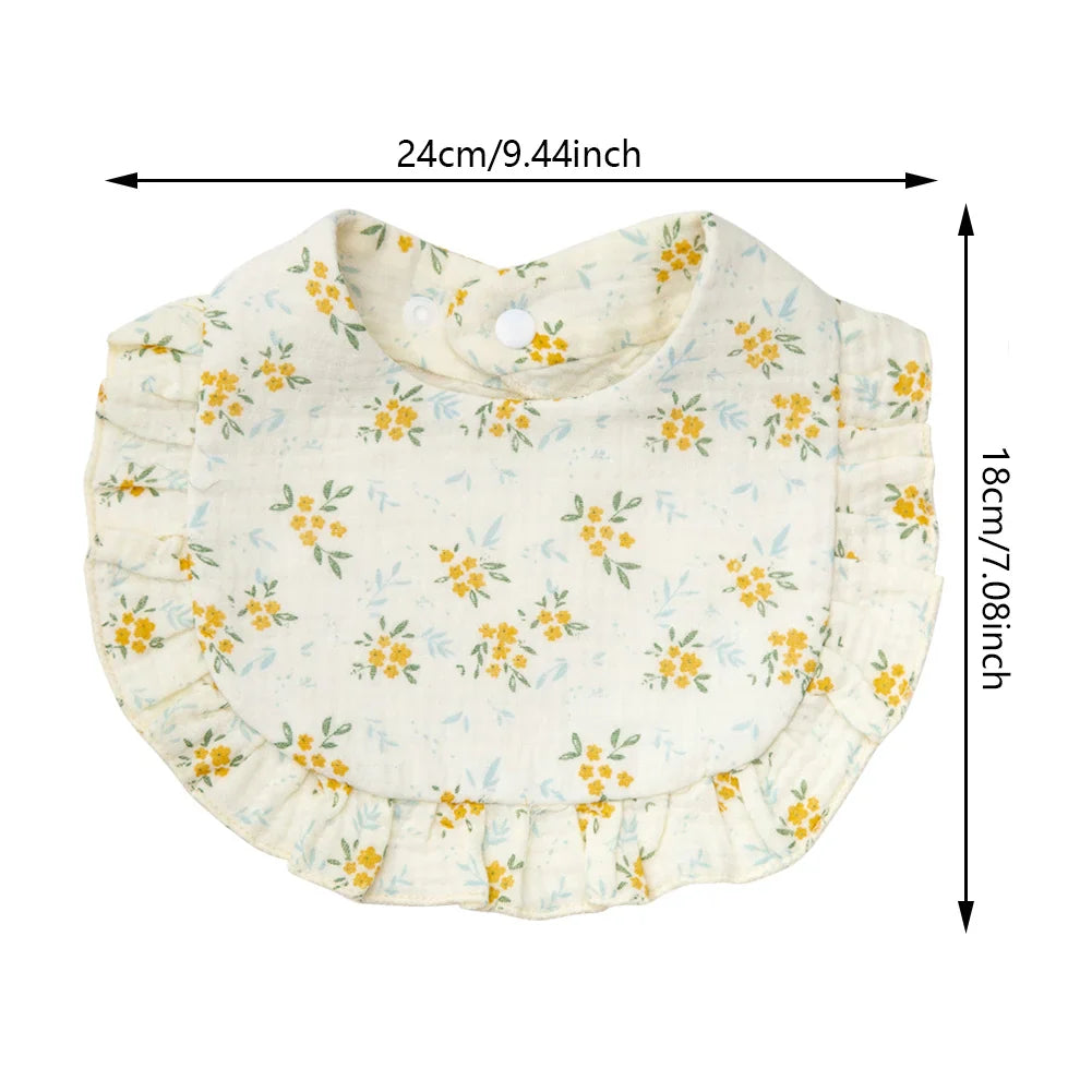 Adjustable snap cotton bib for babies, showcasing a cute flower print, functions as a stylish burp cloth.