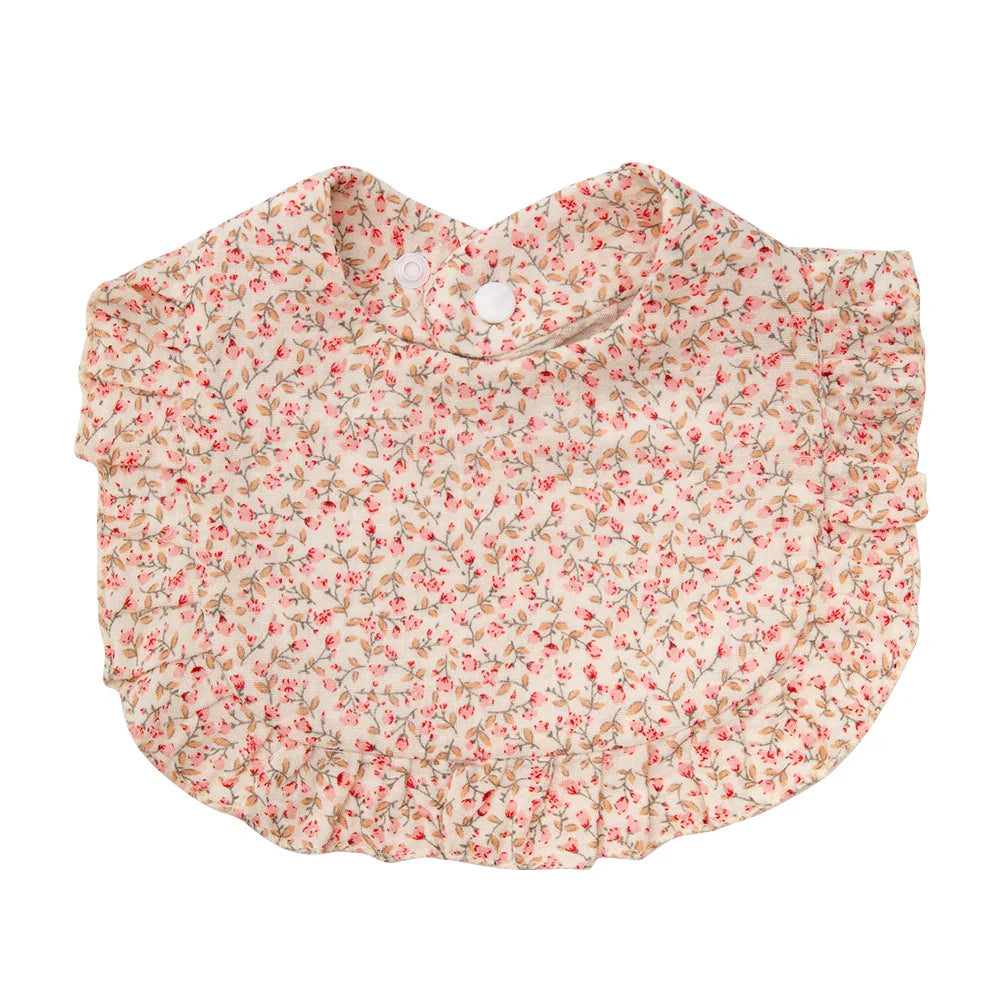 Infant burp cloth and feeding bib, cotton with an enchanting flower print and adjustable snap.