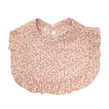 Infant burp cloth and feeding bib, cotton with an enchanting flower print and adjustable snap.
