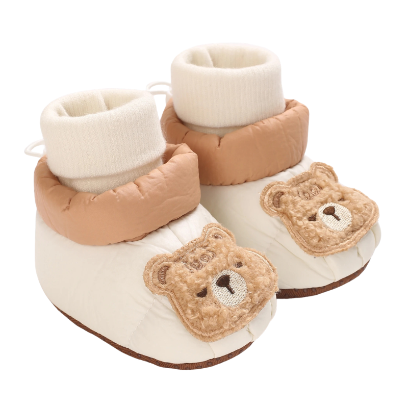 Pair of gentle infant socks combined with cotton baby shoes, designed for supportive first steps