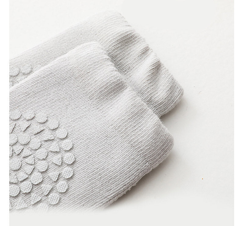 Baby knee pads & anti-slip socks, providing comfort and preventing slips during playtime.